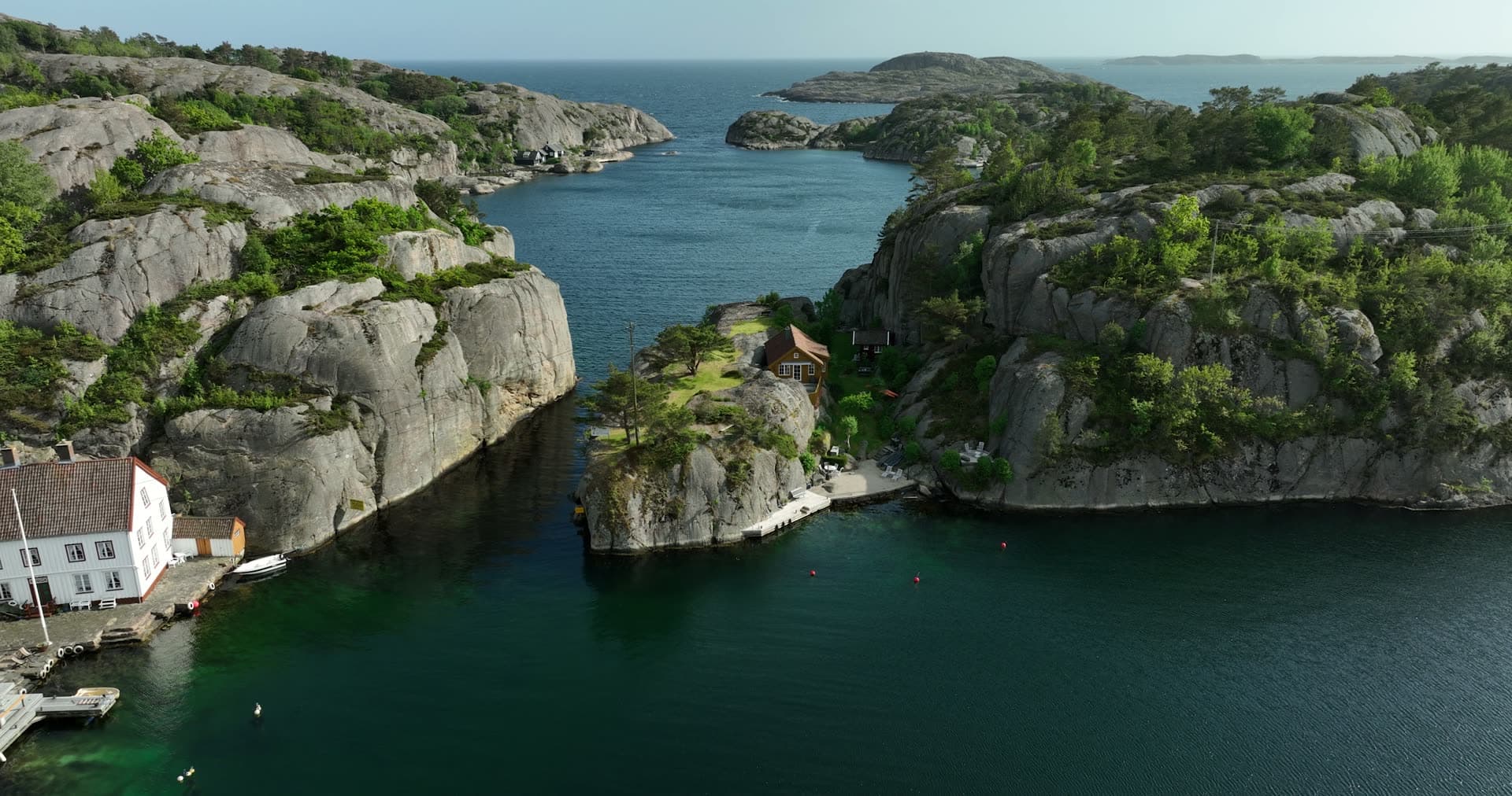 Deep blue water and small fishing boats, Ny-Hellesund