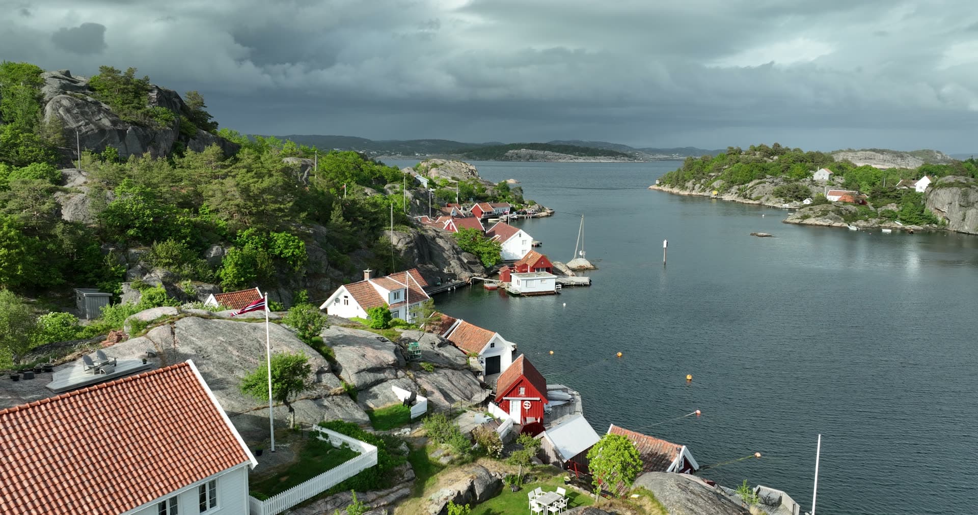 Red and white cottages and nature and architecture blend, Ny-Hellesund
