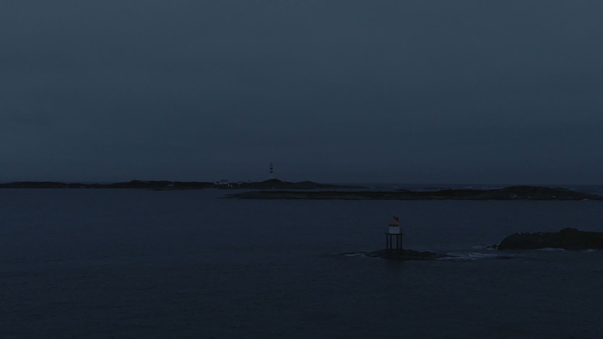 Coast line at night with light house, Kristiansand