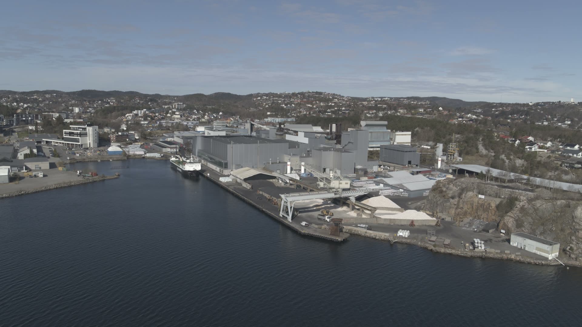 Gray industrial buildings and spring or autumn, Kristiansand