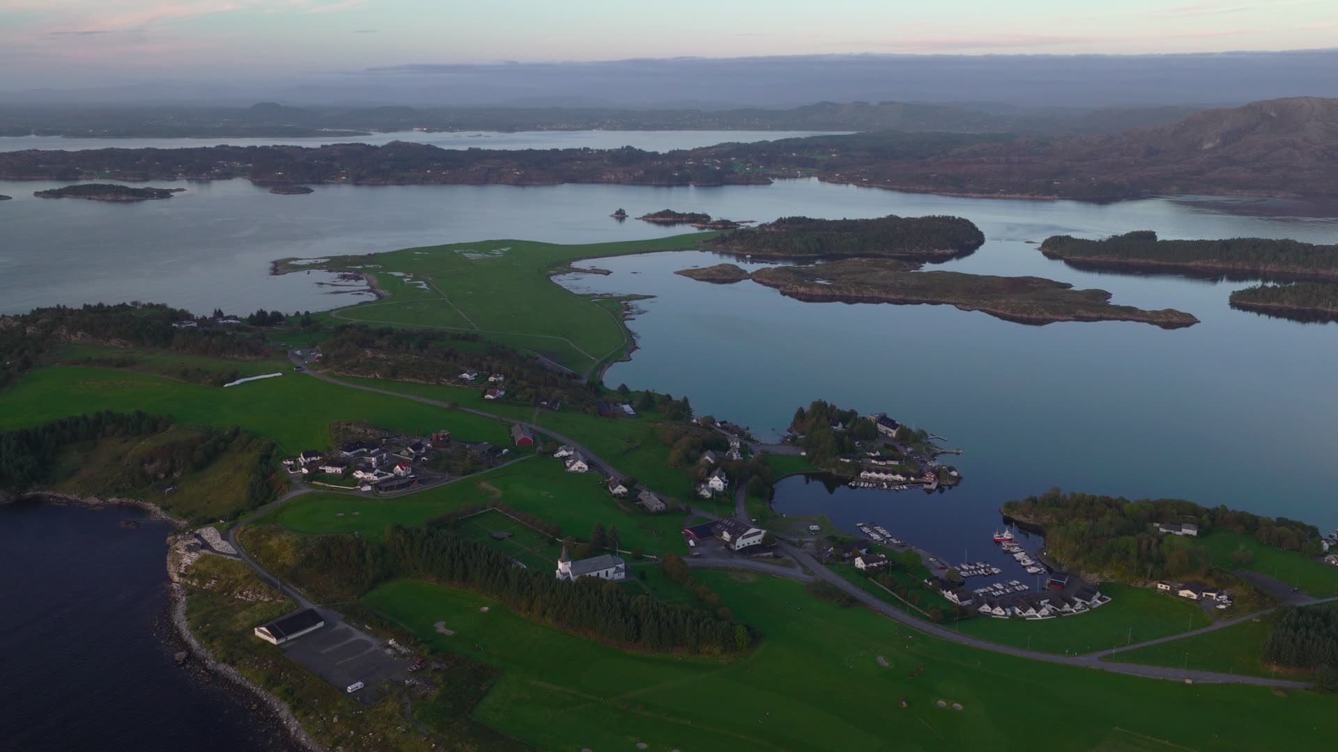 Norwegian fjord island communities and waterfront homes, Herdla