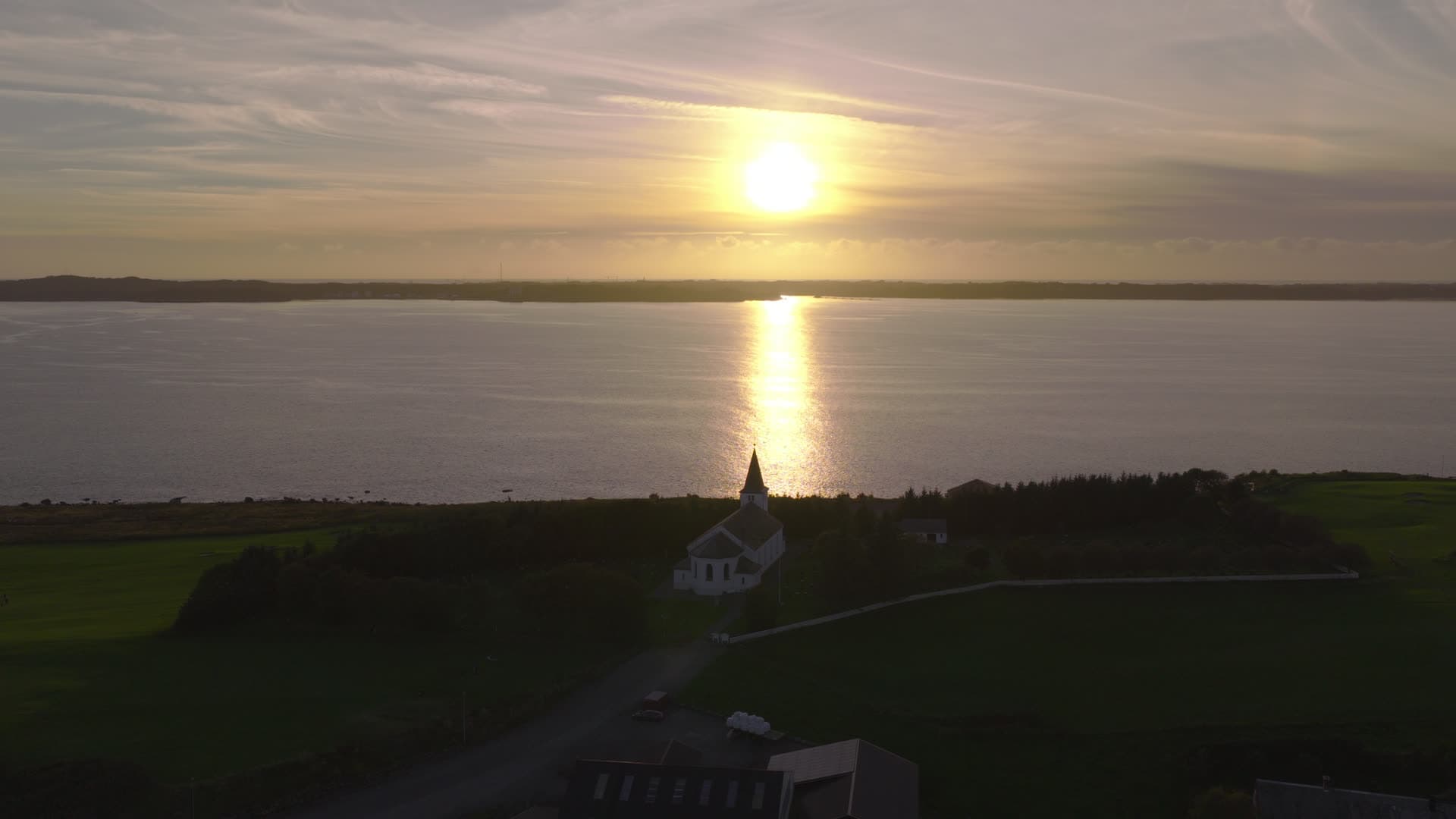 Church by the water at sunset, Herdla
