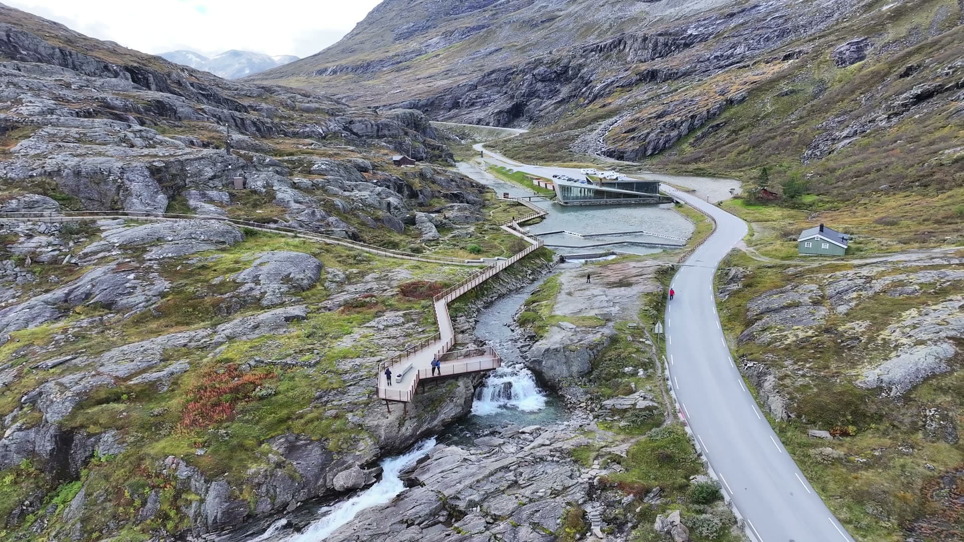 Mountain road and flowing river at Trollstigen, Norway
