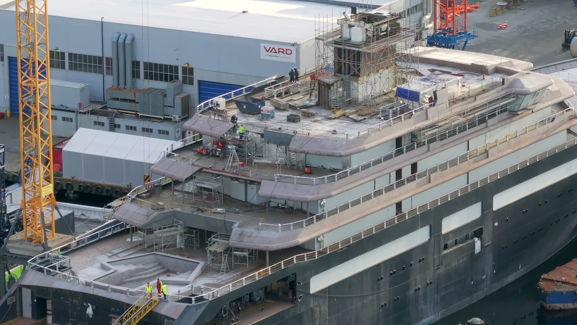 Close aerial view of scaffolding around REV Ocean upper decks