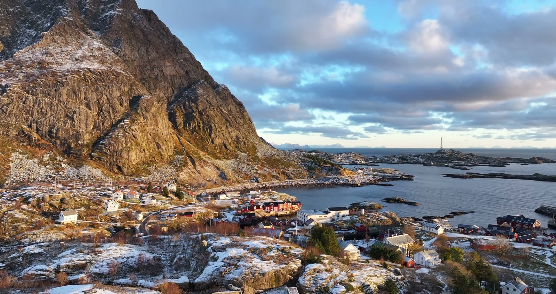 Winter aerial panorama of Å village and rocky coast in Lofoten