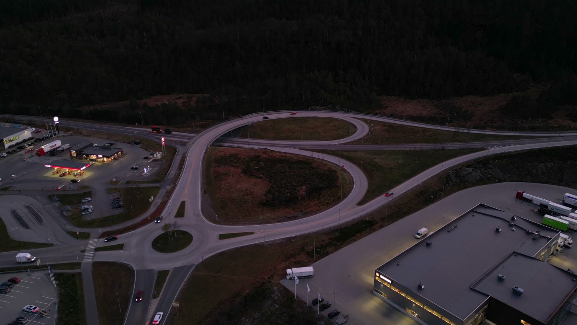 Illuminated road interchange at Digernes in evening light