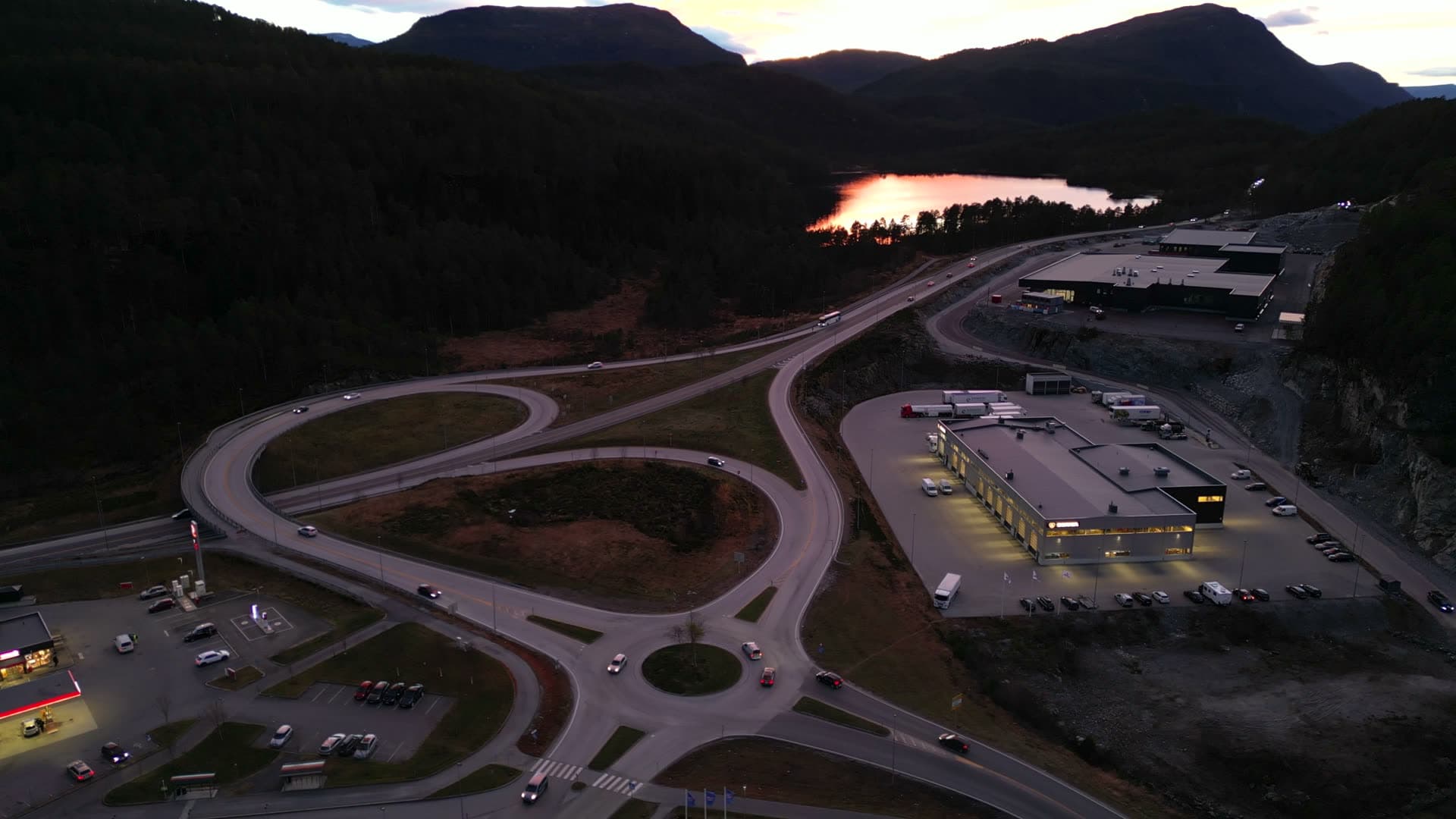 Aerial approach to Digernes business park at twilight