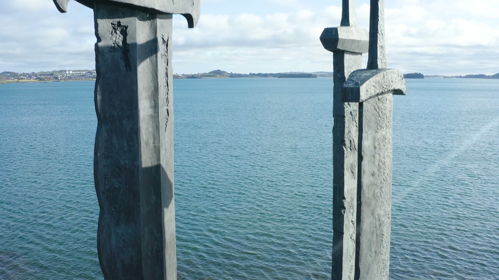 Coastal Three Swords in stone overlooking bay, Sverd i fjell