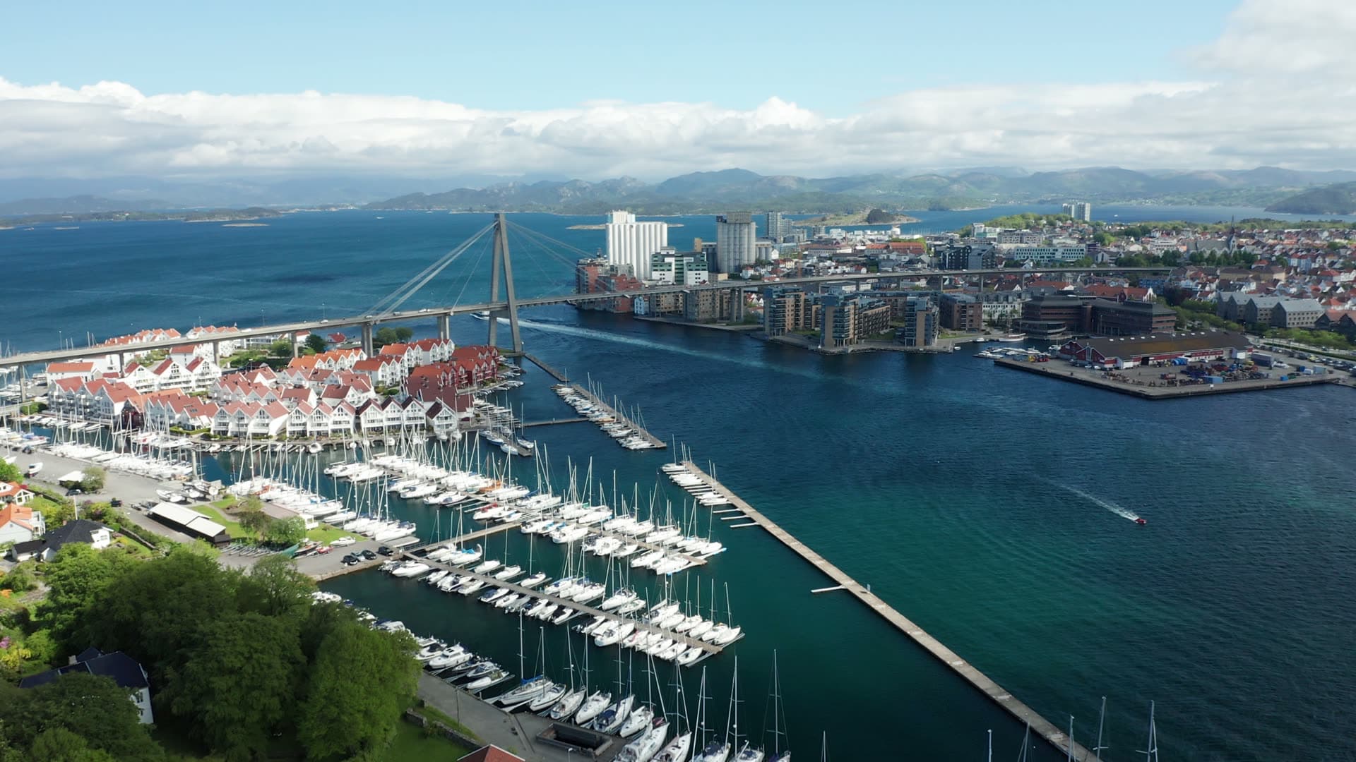 Marina with sailboats and cable-stayed bridge, Stavanger