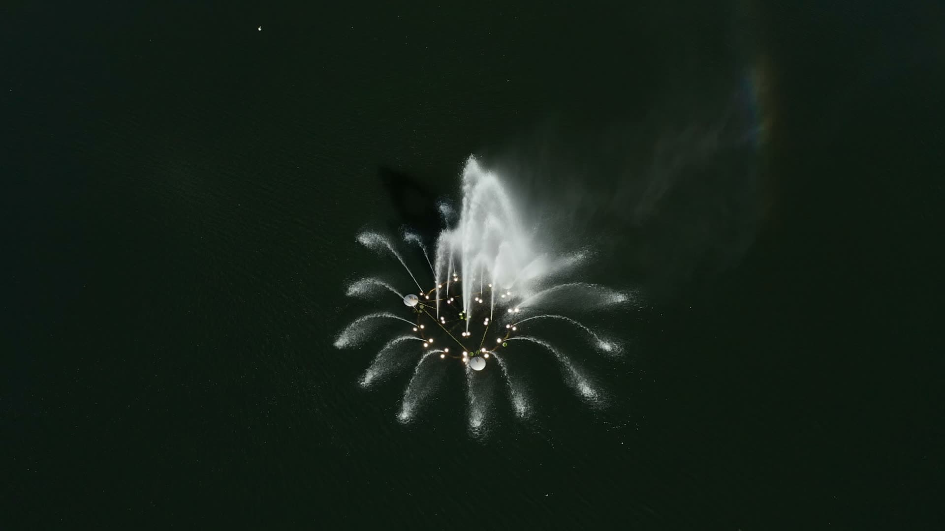 Fireworks bursting over water at night, Stavanger
