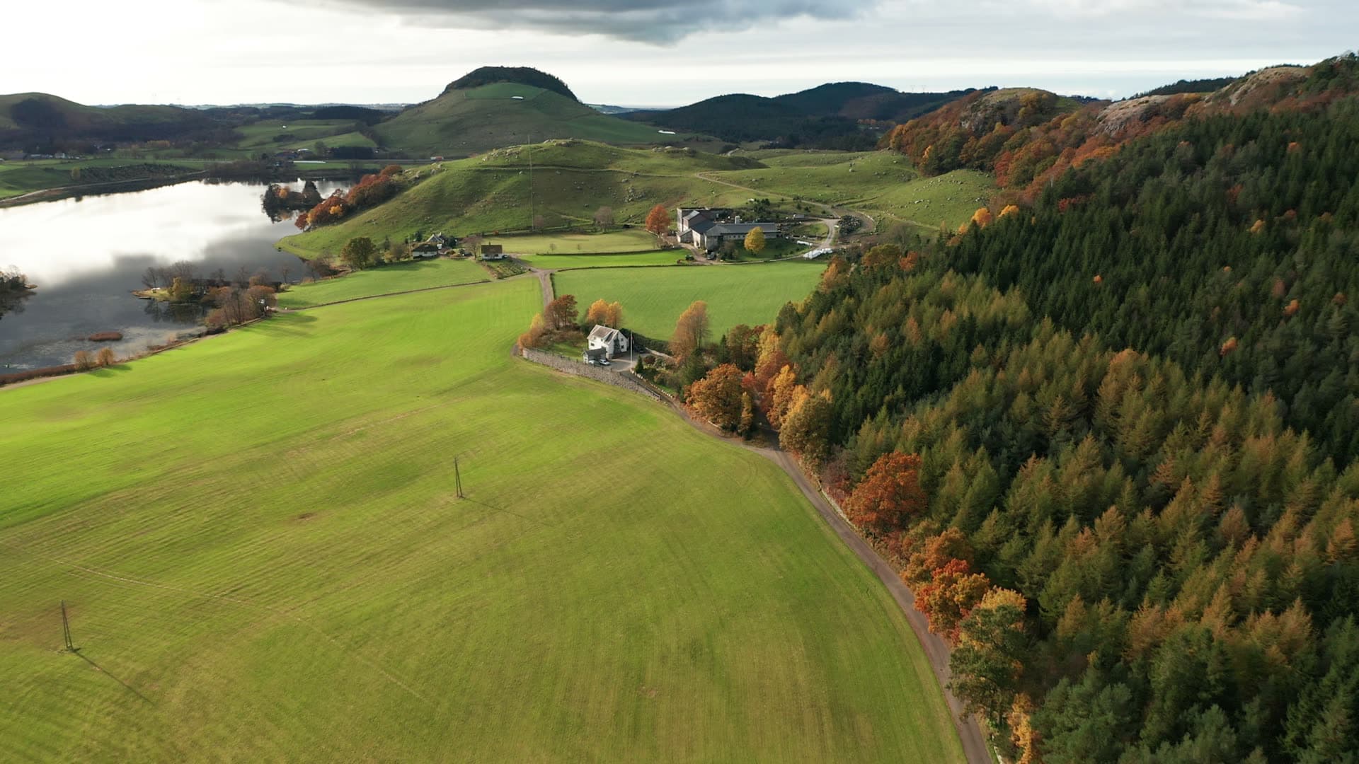 Rural farmland with autumn forests and lake, Bråsteinvatnet