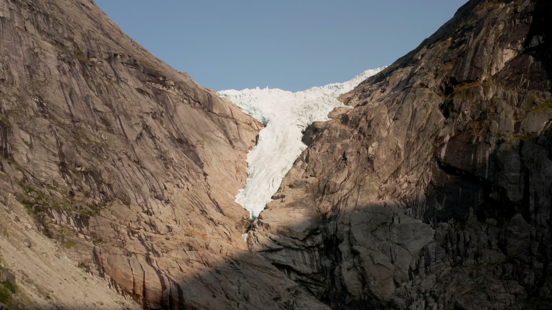 Glacier between mountain cliffs, Briksdalsbreen