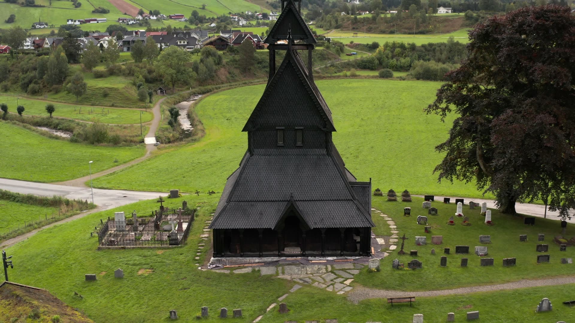 Black wooden stave church with cemetery, Hopperstad stavkirke