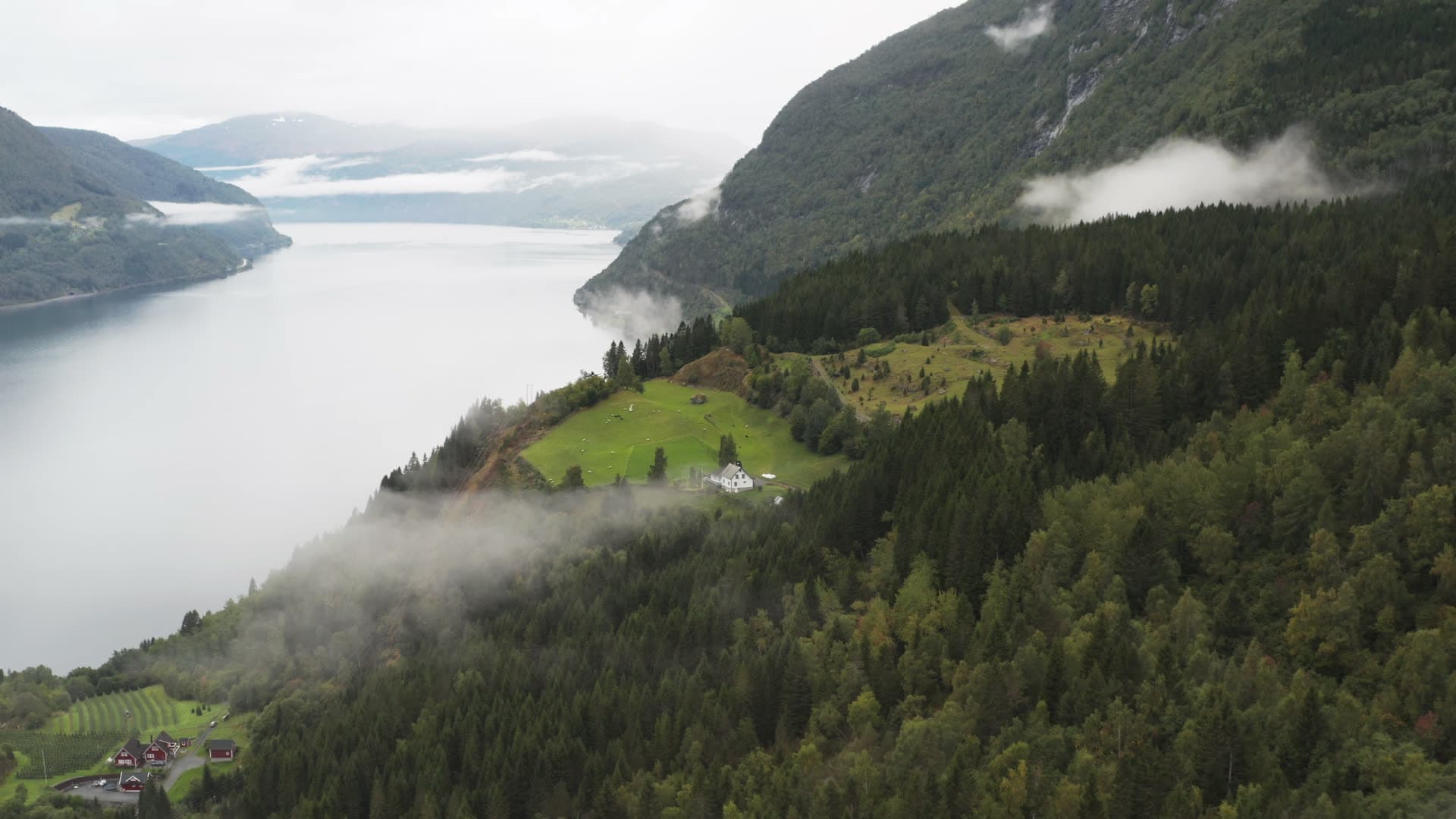 Mountain valley with alpine lake and settlement, Innvikfjorden