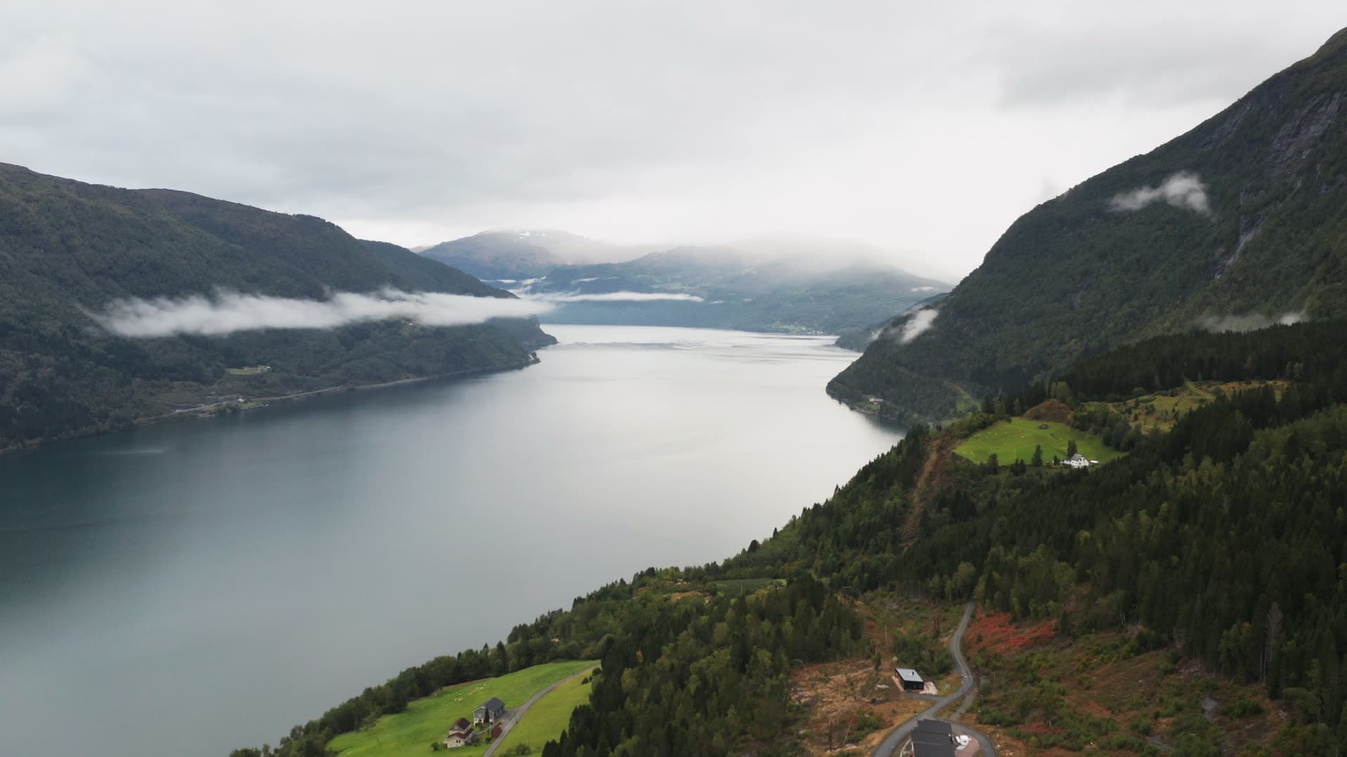 Mountain fjord valley with scattered houses, Innvikfjorden