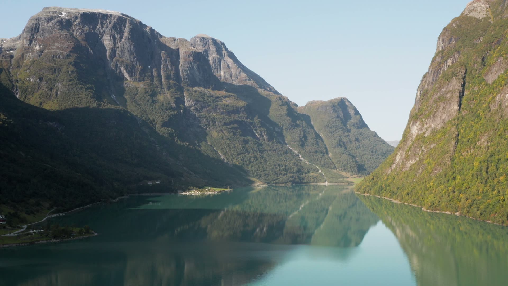 Fjord with steep cliffs and mirror reflection, Oldevatnet