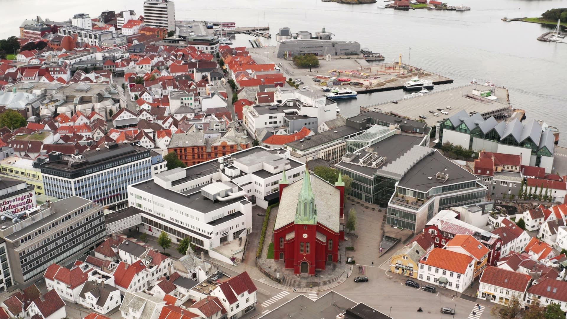 Historic coastal town with red brick church, Stavanger