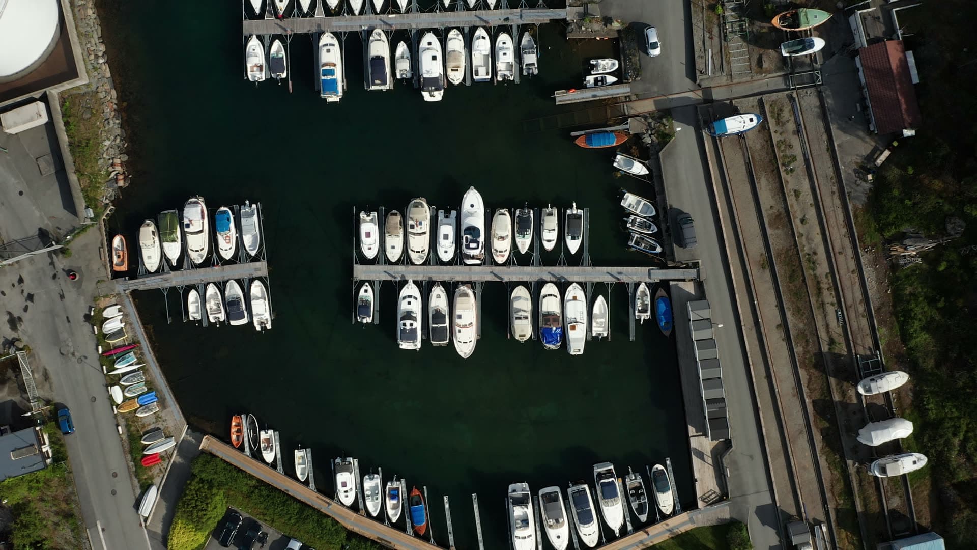 Boats moored at marina basin, Lervig