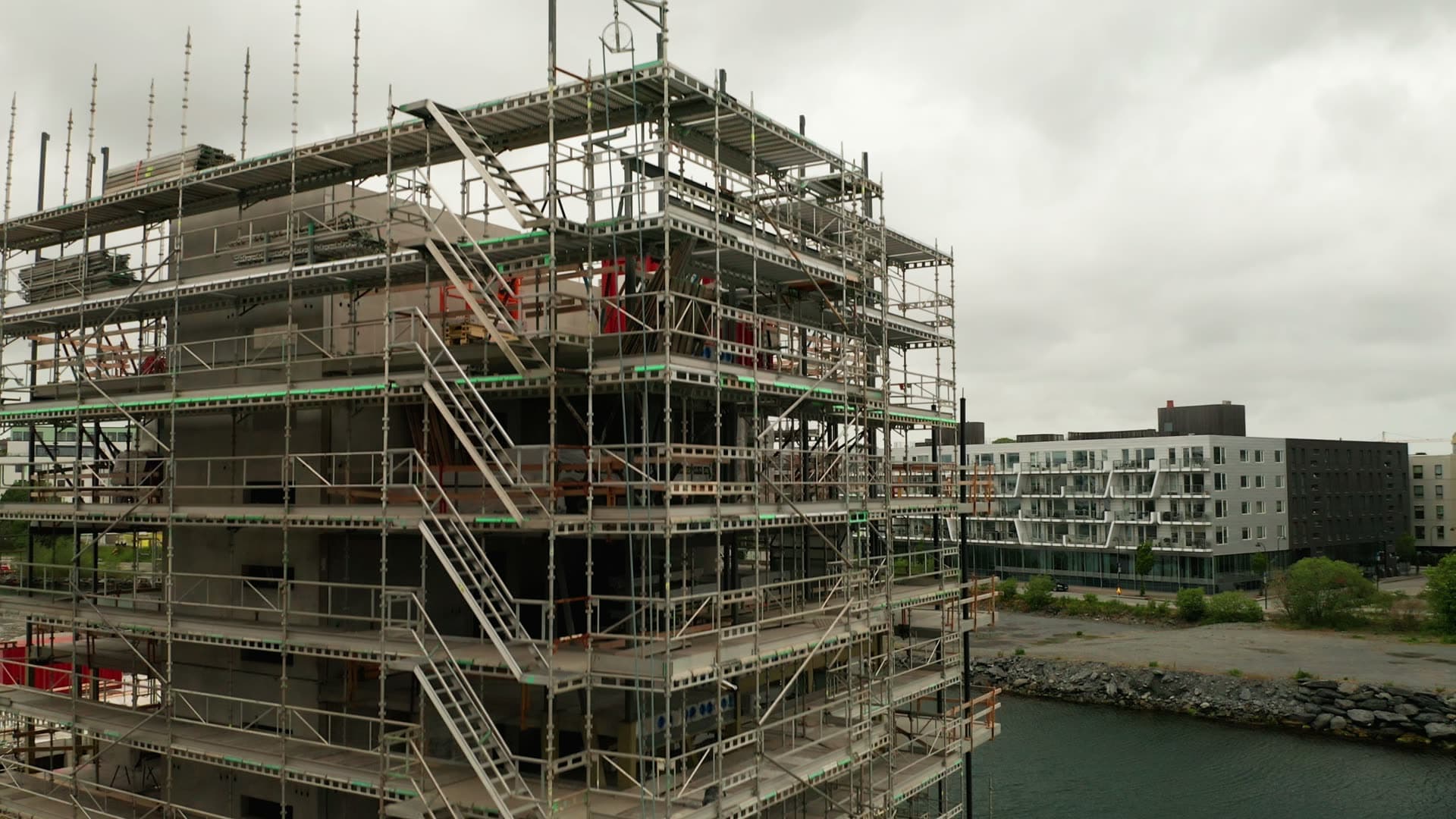 Residential building construction with scaffolding, Lervig