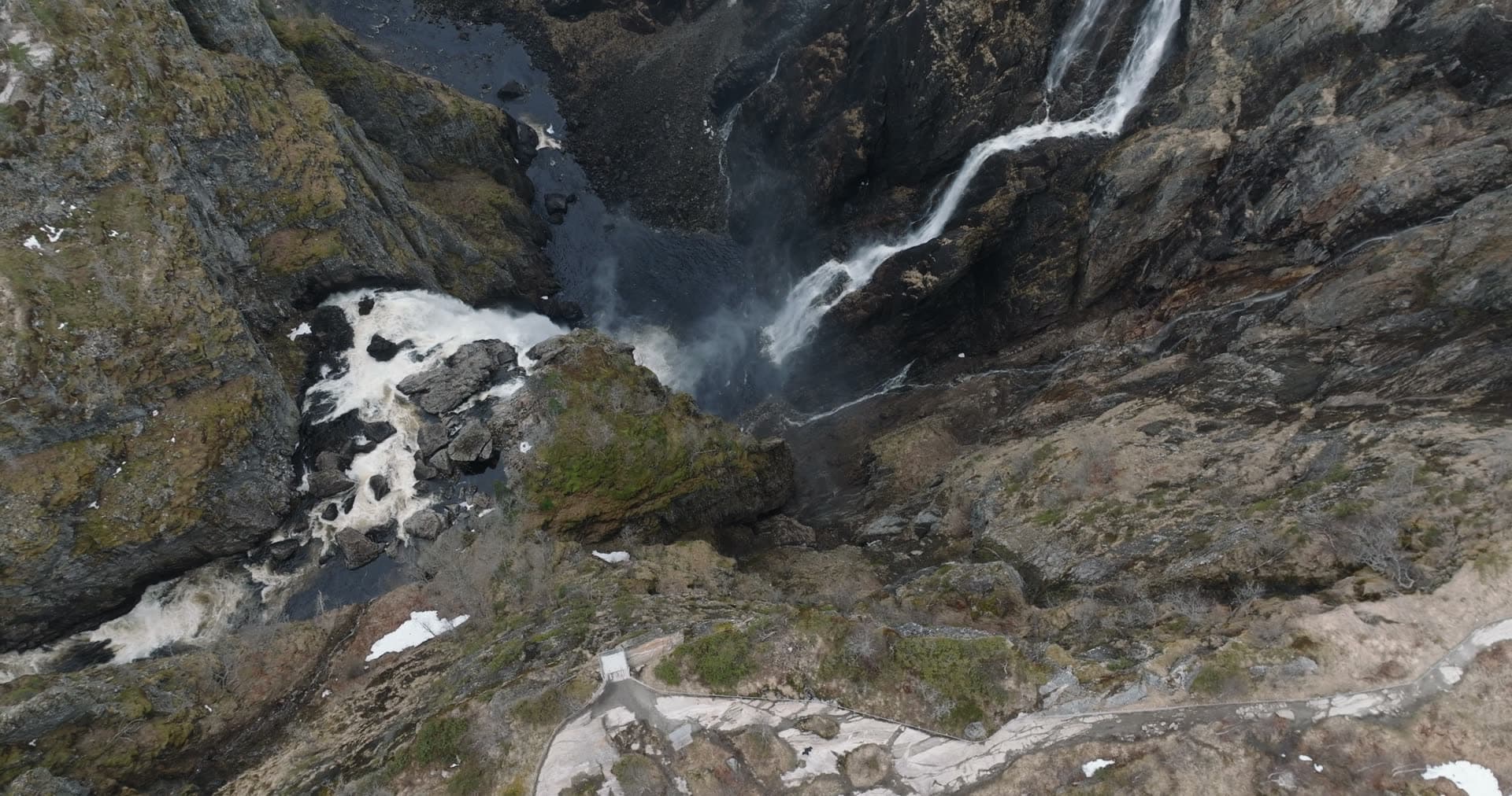 Mountain waterfall through rocky gorge, Vøringsfossen