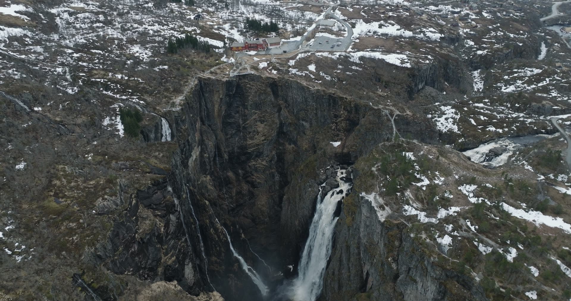Waterfall through narrow rocky gorge, Vøringsfossen