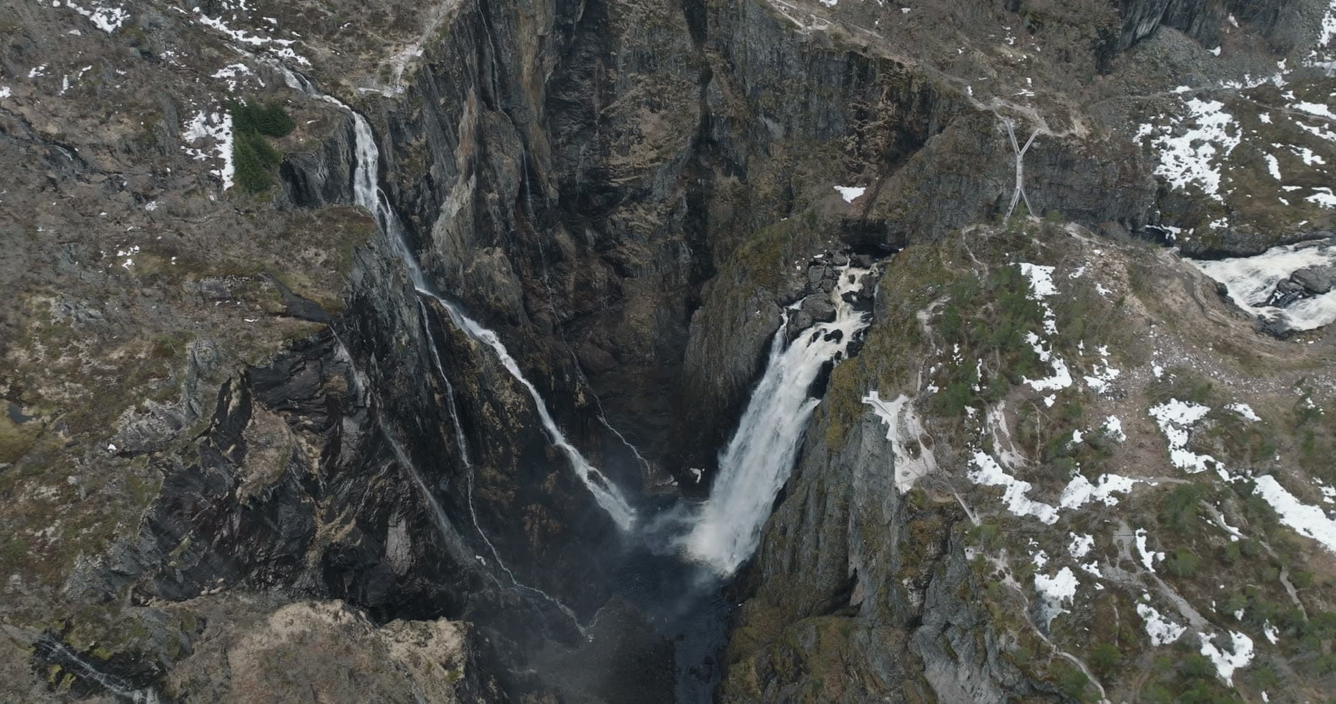 Mountain waterfall in rocky gorge, Vøringsfossen