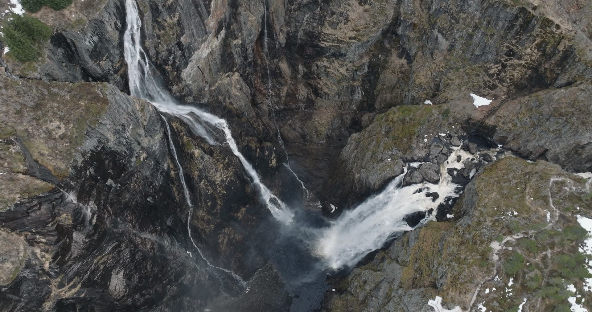 Waterfall cascading through mountain gorge, Vøringsfossen