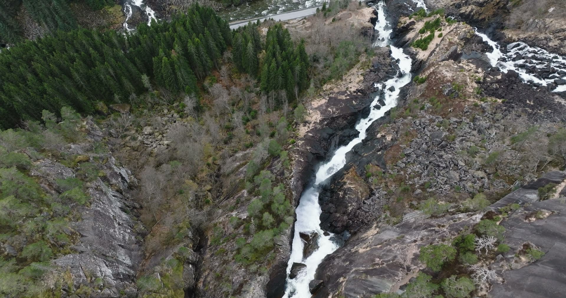 Mountain river gorge with canyon road, Låtefossen