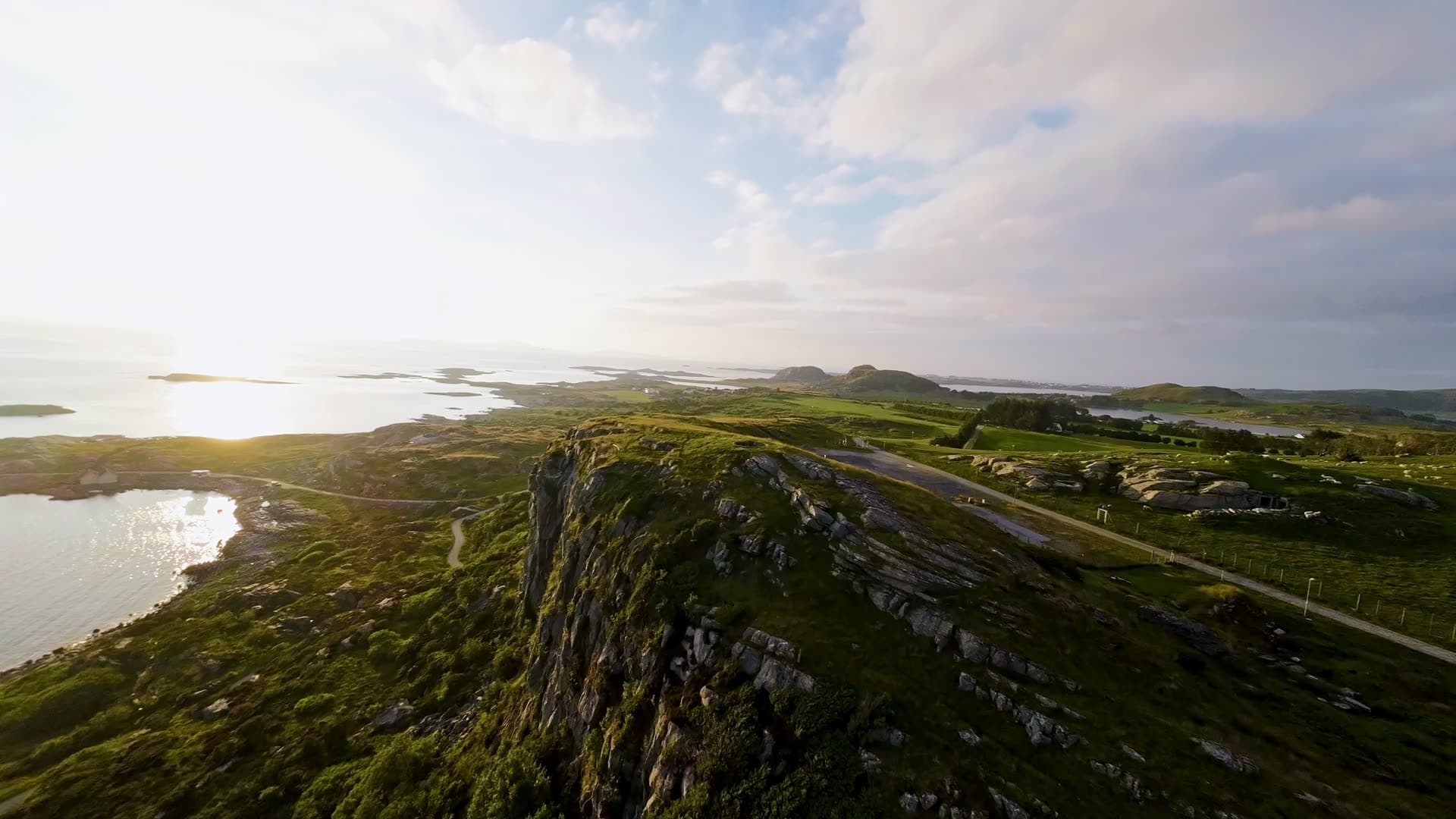 Basalt cliff and coastal bay landscape, Fjøløy Fortress
