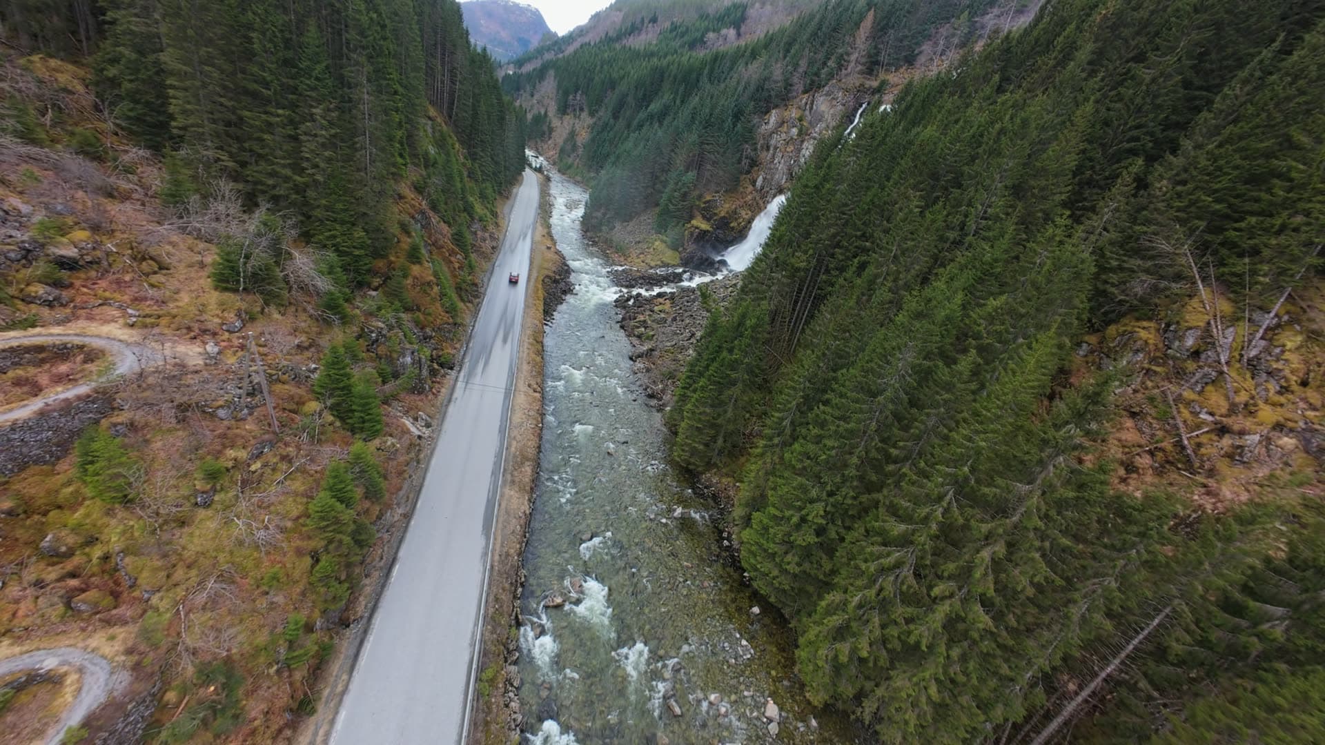 Mountain river valley with waterfalls and road, Vøringsfossen