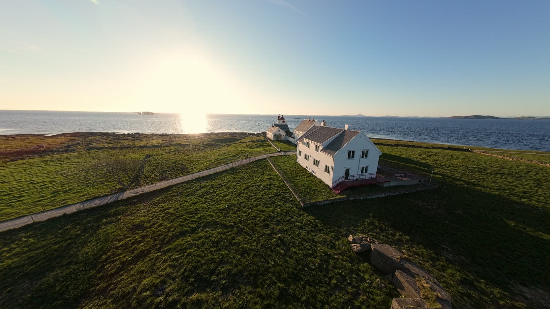 Coastal house and sheltered harbor, Tungenes fyr