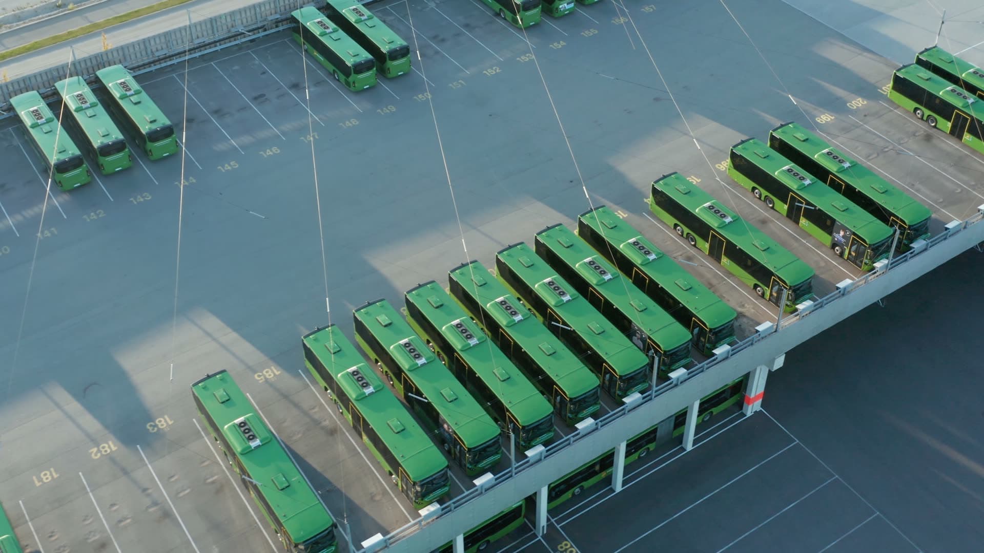 Kolumbus Electric buses parked at charging depot, Forus