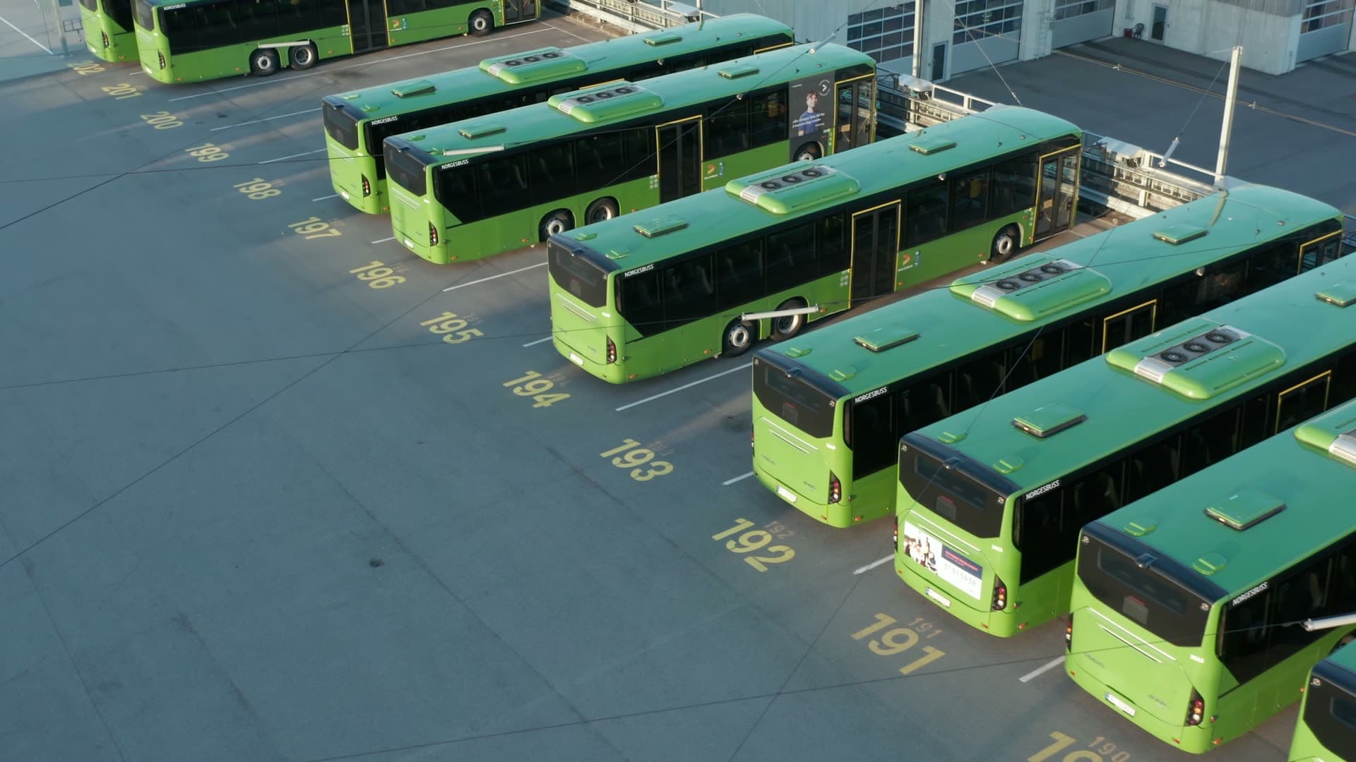Kolumbus Green buses parked at depot terminal, Forus