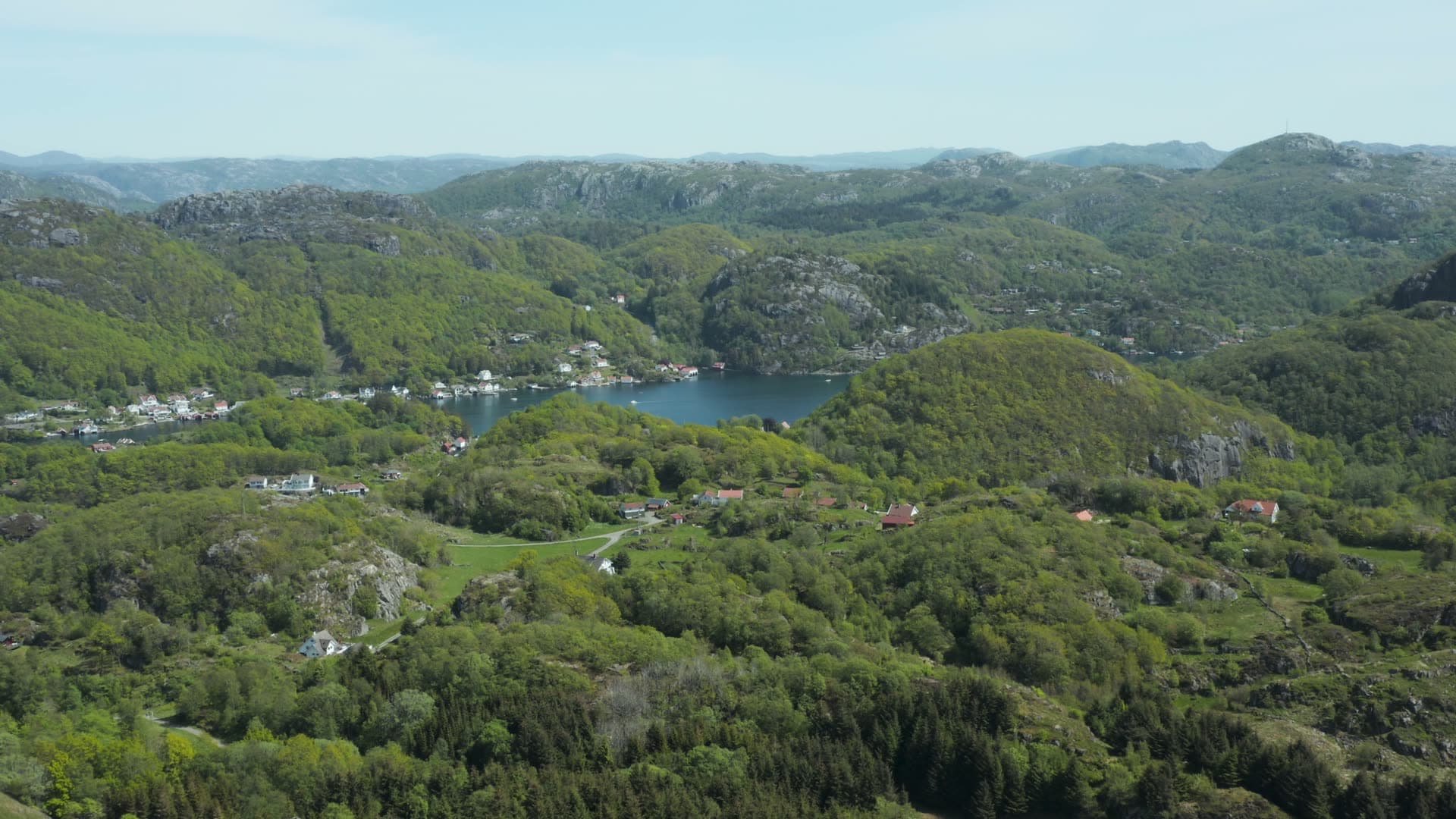 Lake in forested mountain valley, Hågåsen kystbatteri