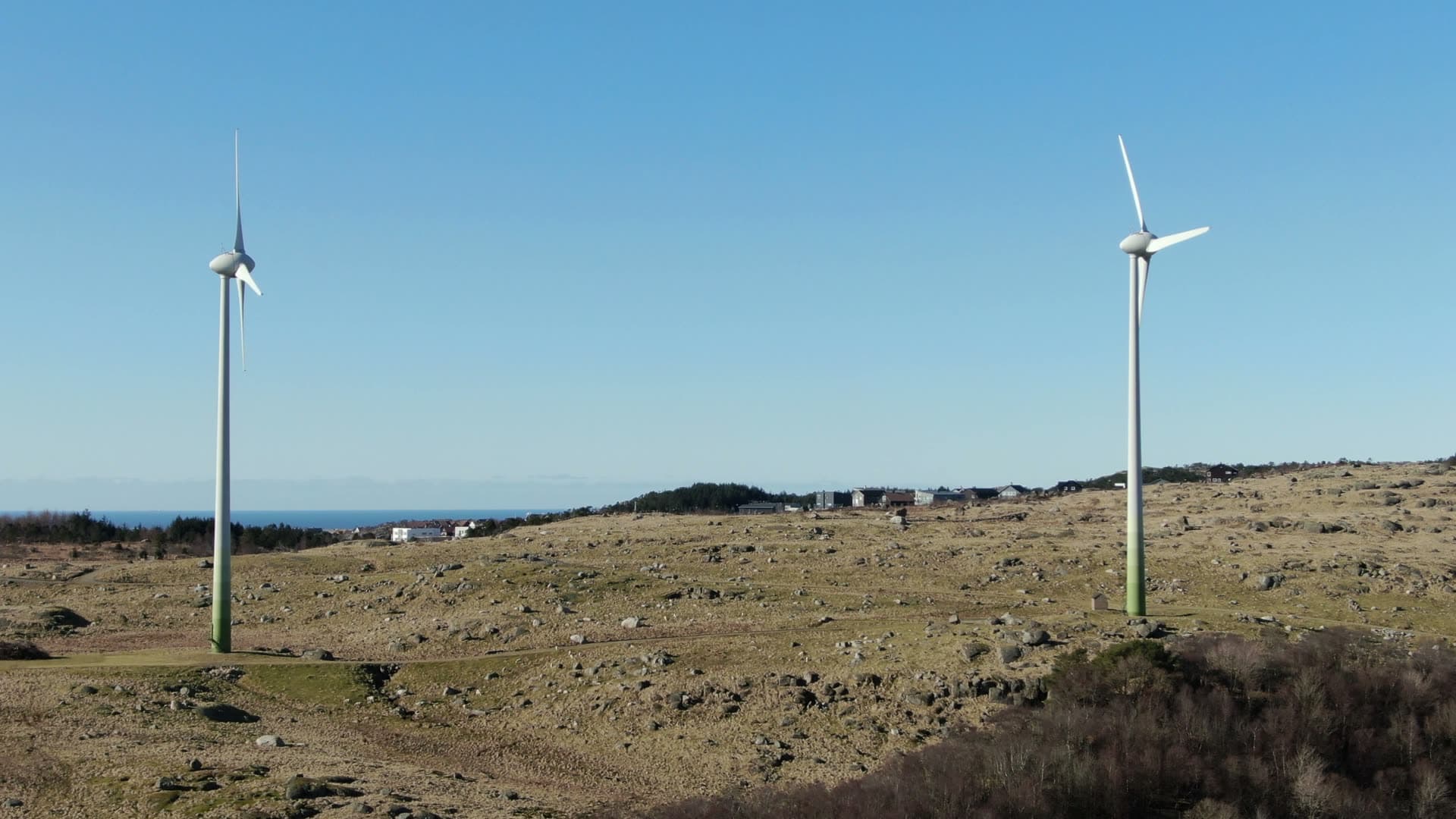 Small wind turbines on coastal hillside, Rogaland