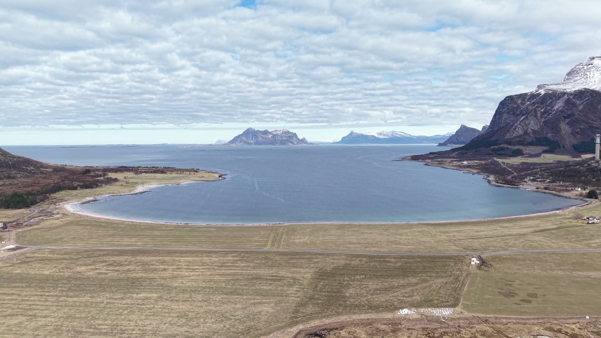 Fjord valley with tidal flats and coastal settlement, Reipå