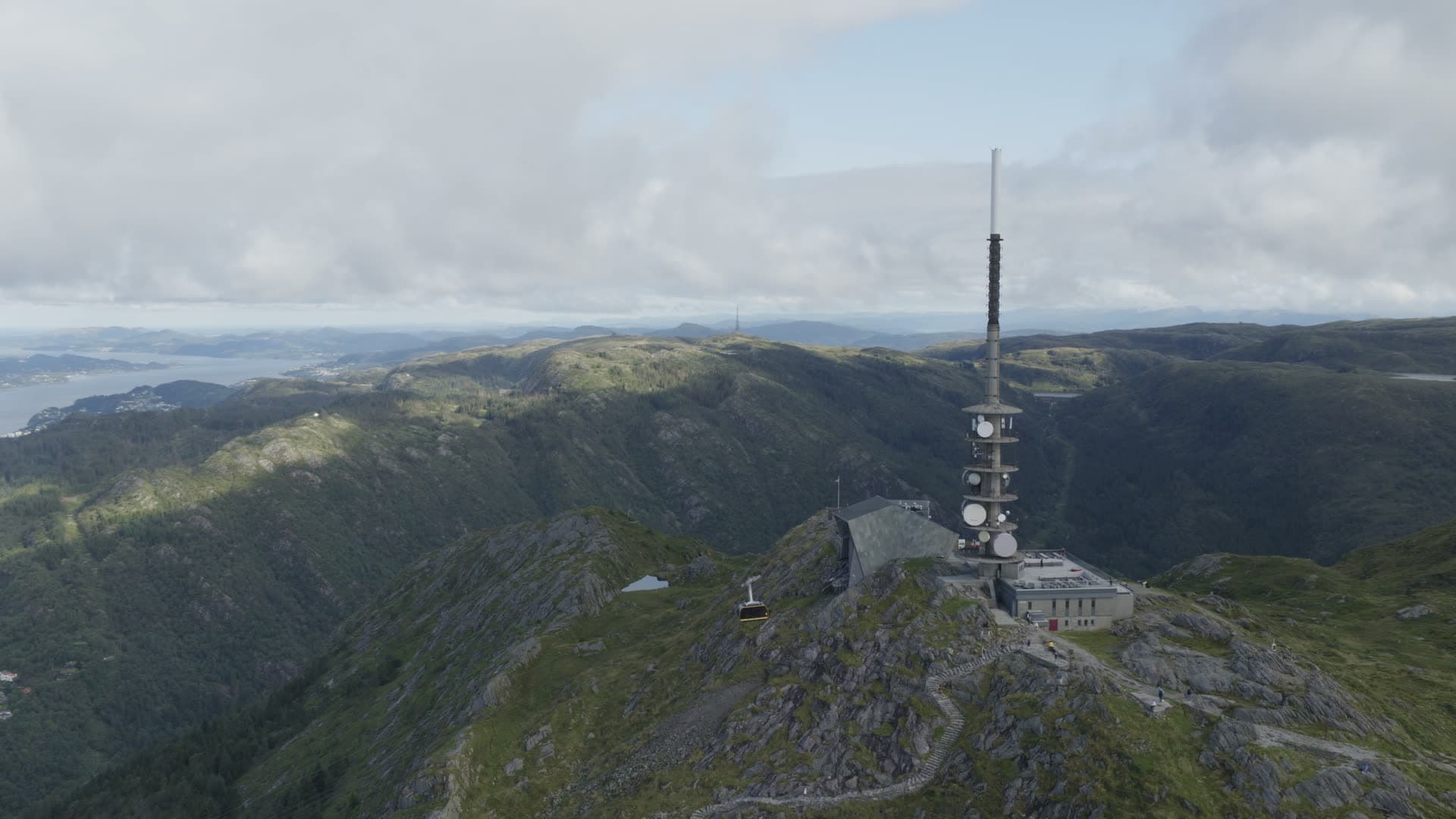 Mountain communication tower with cable car, Alrekstad