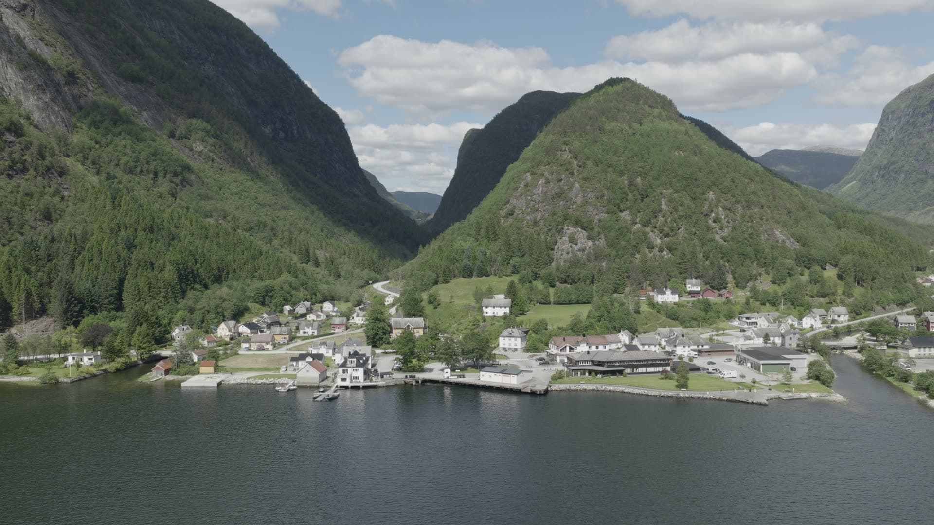 Mountain village on fjord waterfront, Vadheim