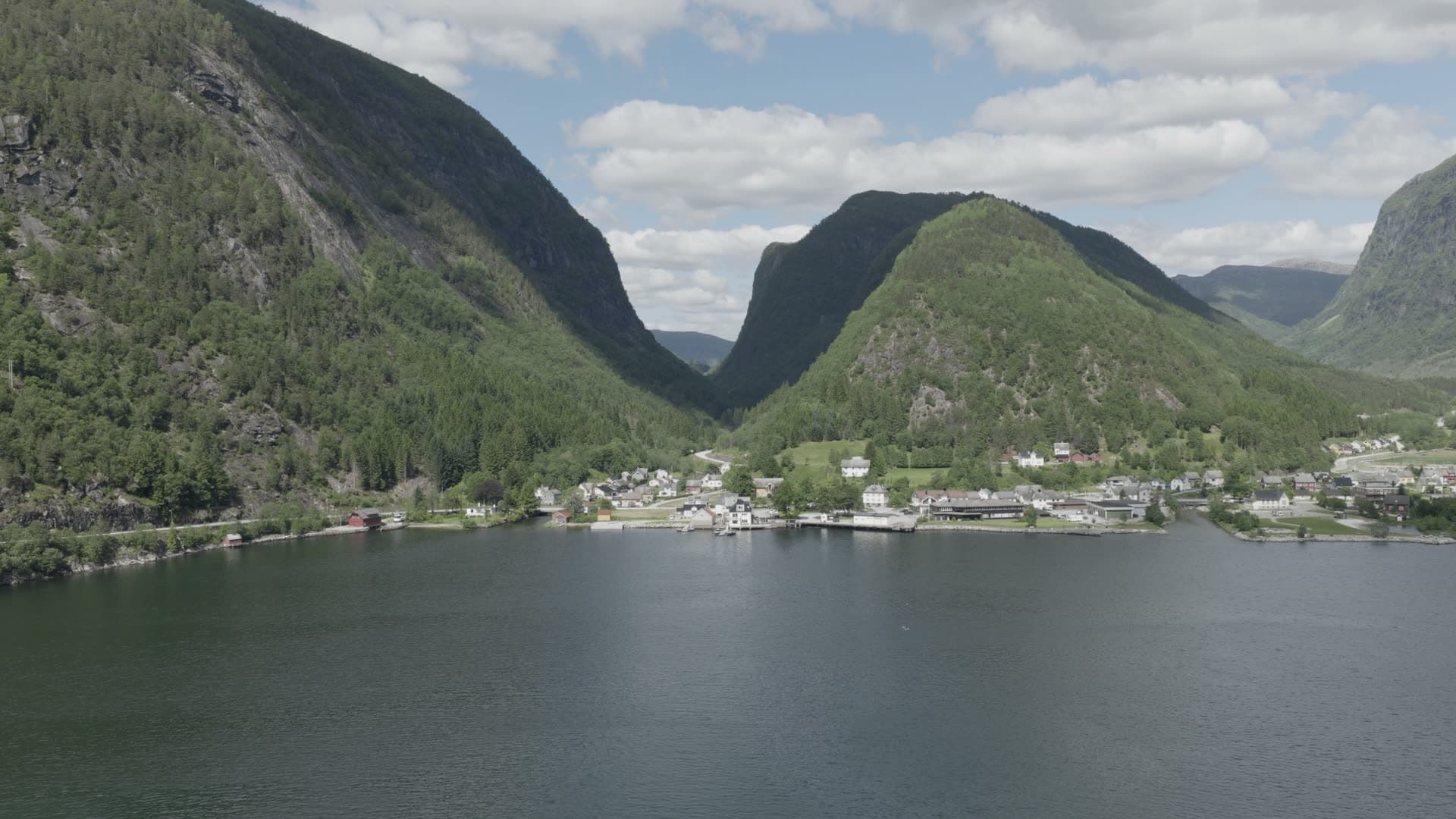 Mountain valley fjord town with waterfront, Vadheim