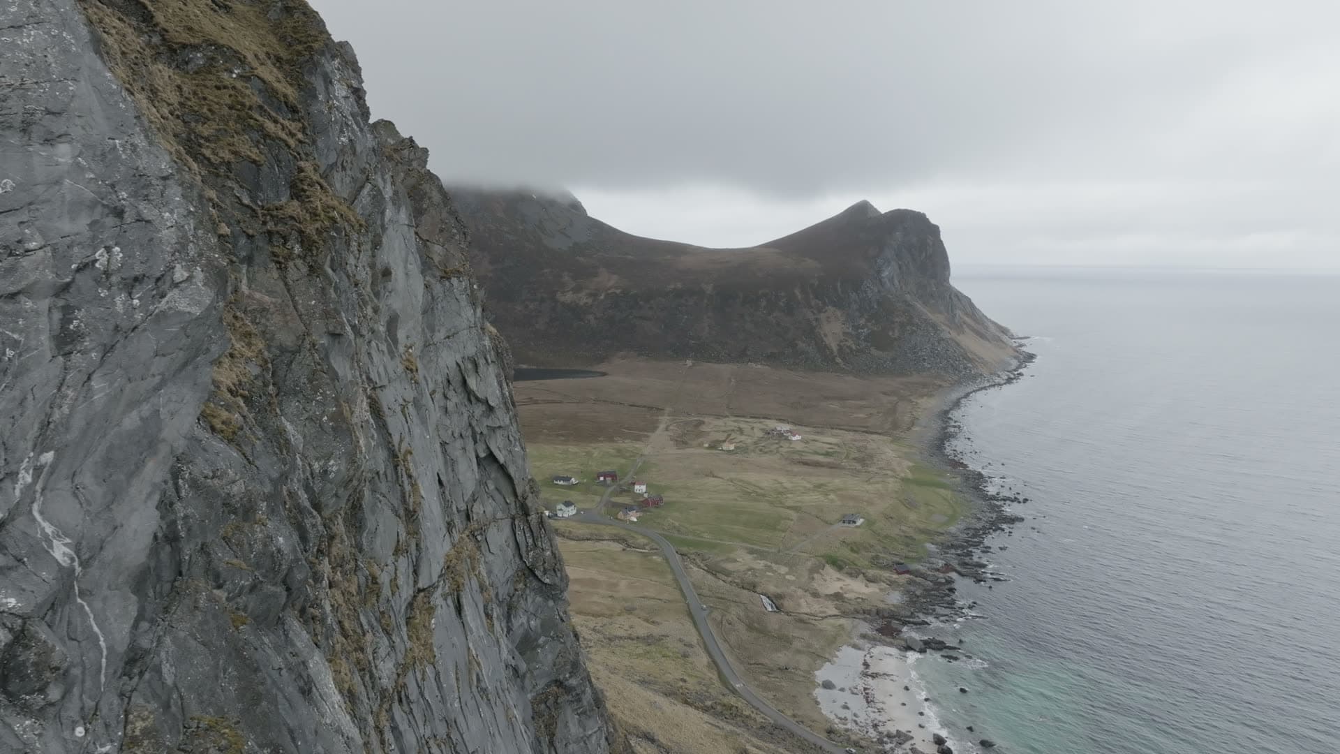 Coastal cliff settlement and mountain peninsula, Myrland