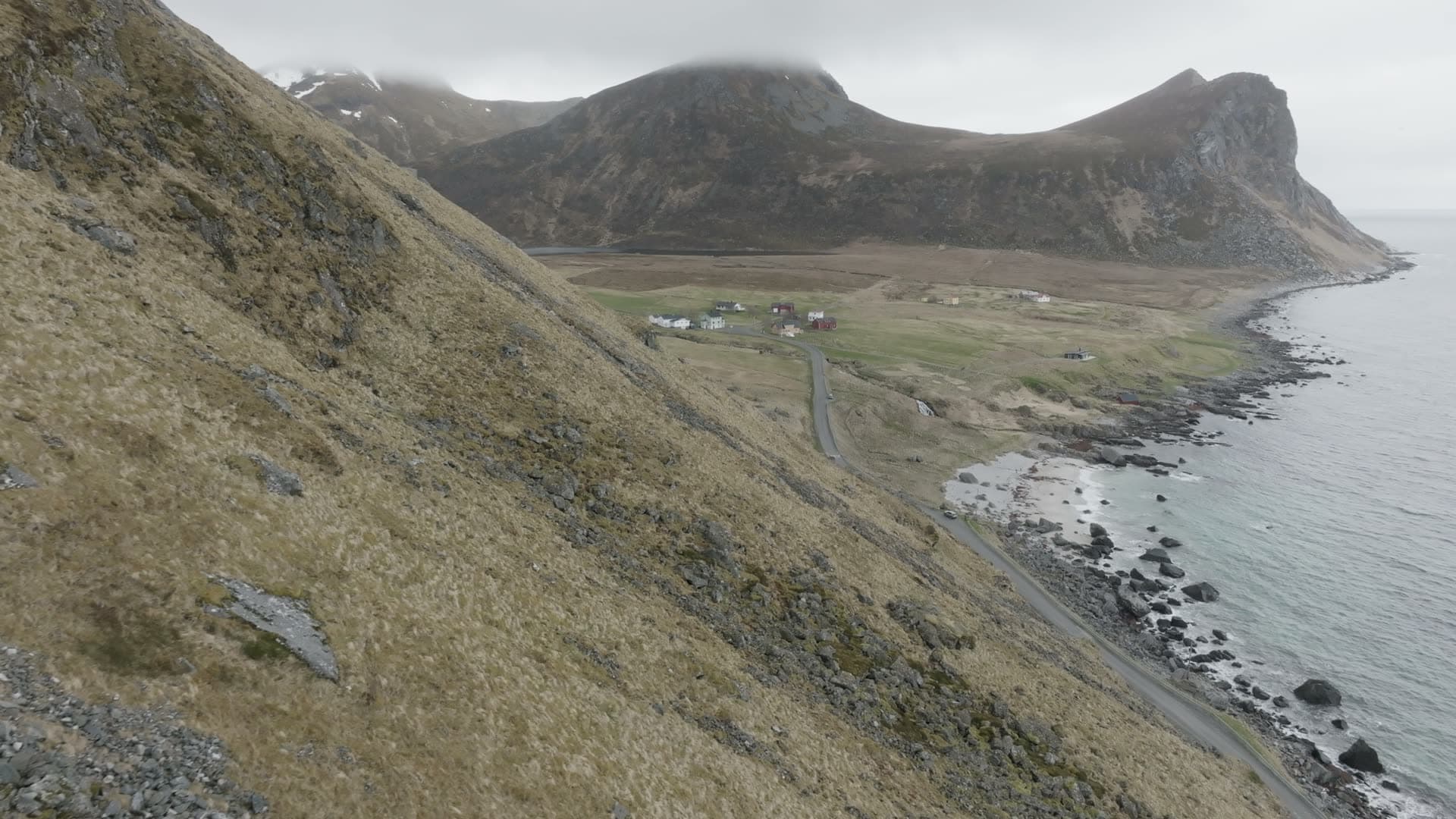 Remote fjord settlement with scree slope, Myrland