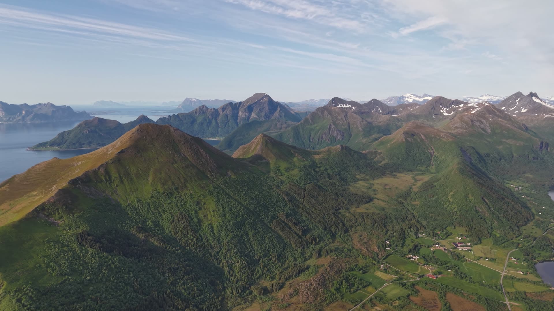 Forested mountain valleys with fjord coast, Meløy