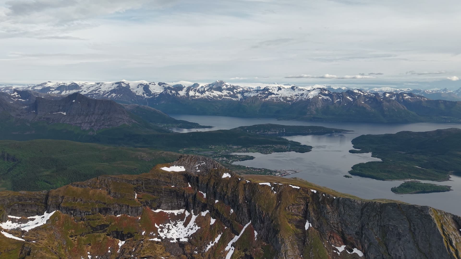 Rocky plateau overlooking fjord and islands, Meløy