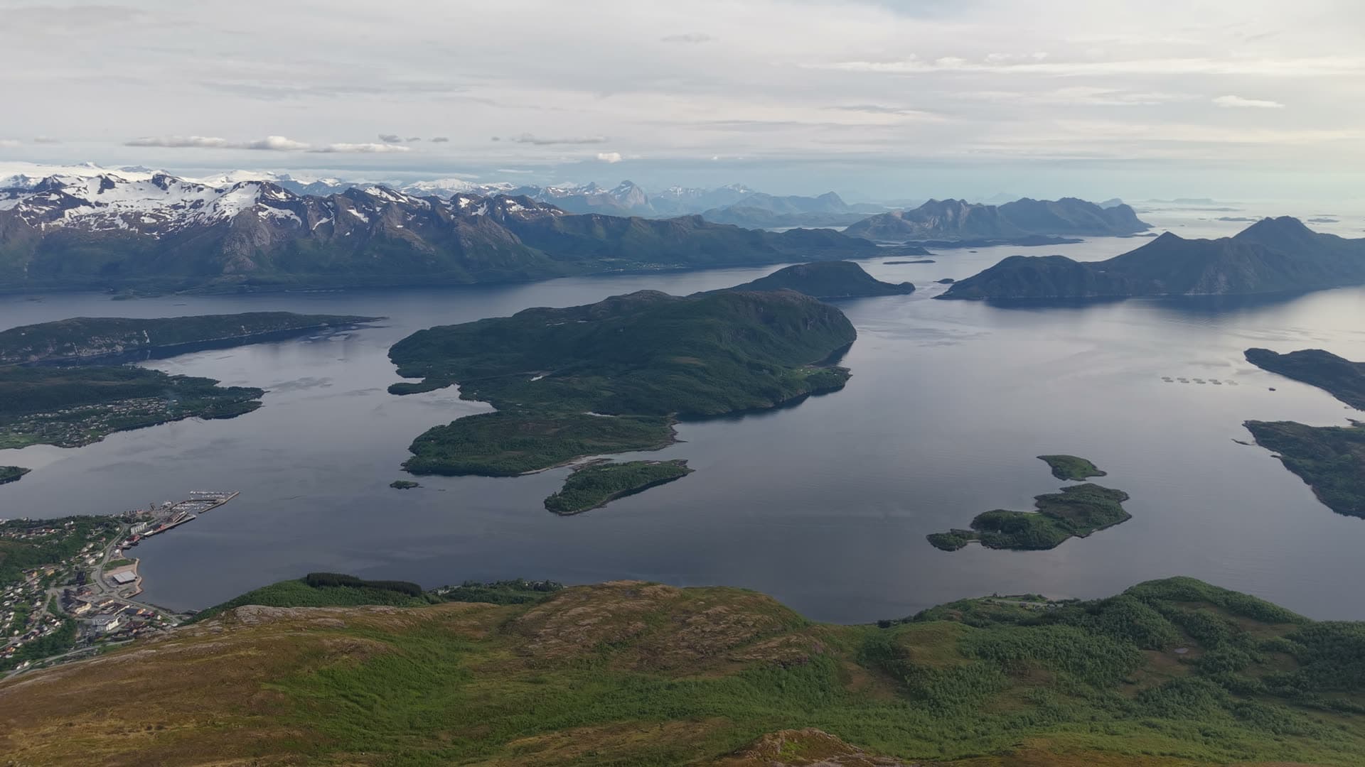 Fjord with forested islands and alpine peaks, Meløy