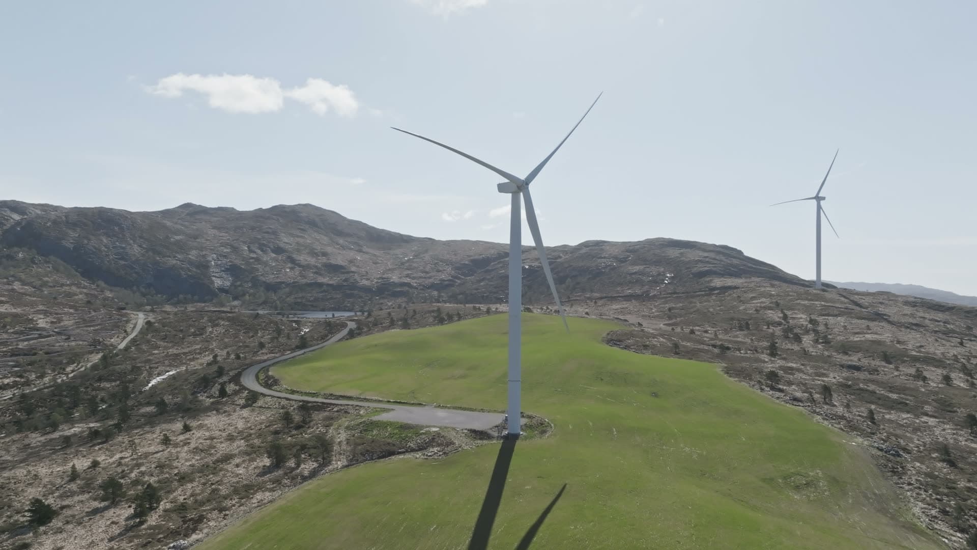 Wind turbines on moorland hills, Fitjar