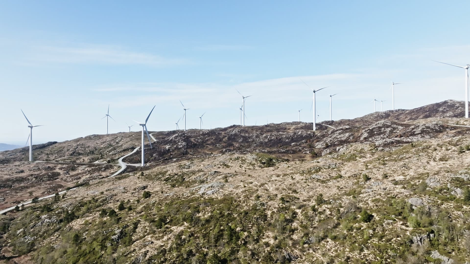 Wind turbine farm on hillside, Fitjar