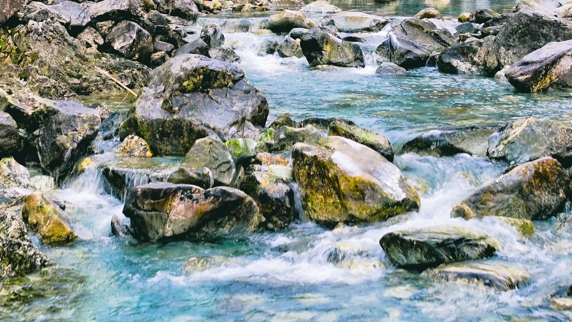Mountain stream with flowing water and rocks, Bergen