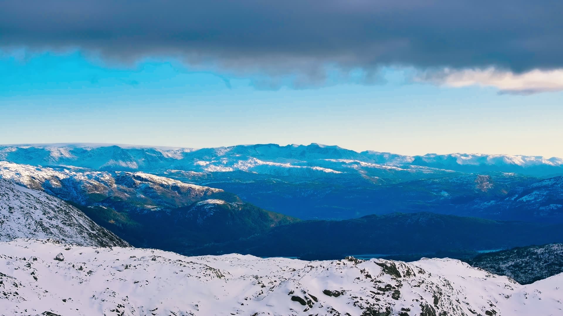 Snow-covered alpine mountain range vista, Bergen