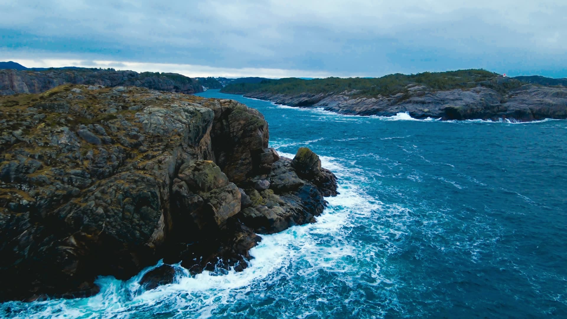 Rocky coastline with ocean waves, Bergen