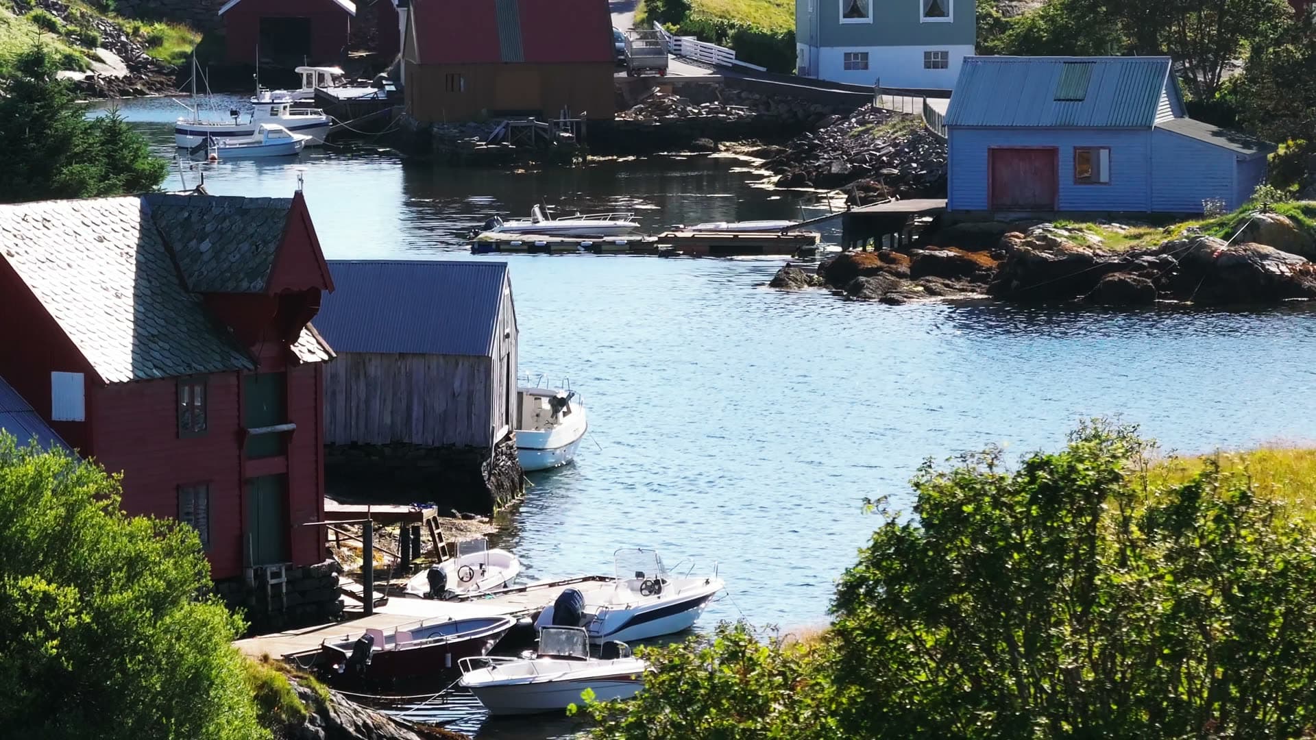 Coastal fishing village with traditional boathouses, Fedje